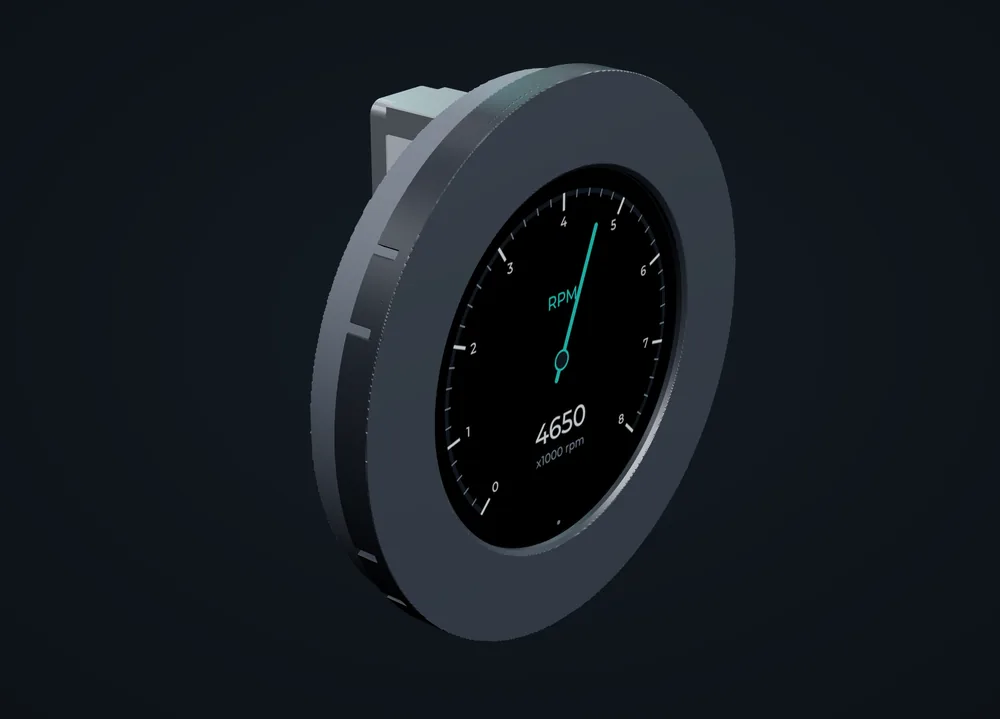 The assembled can2gauge: the 52 mm body and bezel, with the RPM needle page on the glass